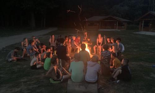 Campers around a bonfire