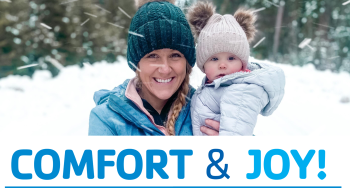 Mother and daughter in winter clothes, text: Comfort &amp; Joy!